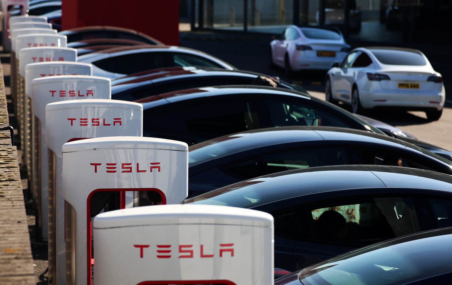epa11937901 Tesla vehicles at a Tesla Motors dealership in London, Britain, 03 March 2025. Tesla sales across the EU, EFTA and the UK fell by over 45 percent between January 2024 and January 2025, acc ...