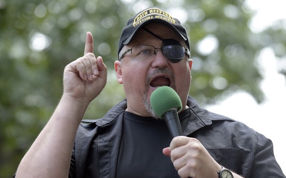 FILE - Stewart Rhodes, founder of the Oath Keepers, speaks during a rally outside the White House in Washington, June 25, 2017. A member of the Oath Keepers who traveled to Washington before the Jan.  ...