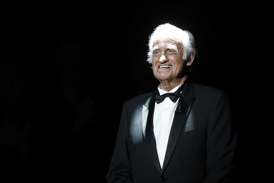 French actor Jean Paul Belmondo appears on stage during the ceremony of the 42nd Cesar Film Awards, at the Salle Pleyel, in Paris, France, Friday, Feb. 24, 2017. This annual ceremony is presented by t ...