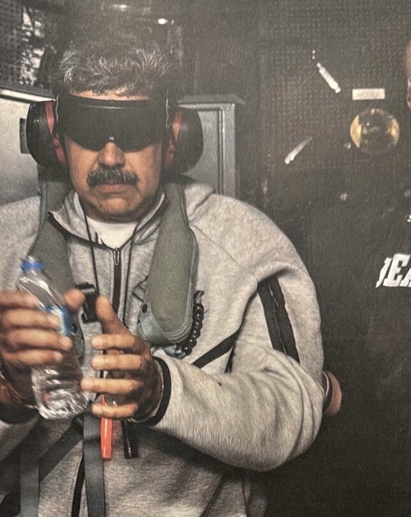 epa12624364 A handout picture made available by the White House Press Office shows Venezuelan President Nicolas Maduro aboard USS Iwo Jima, a Wasp-class amphibious assault ship of the US States Navy,  ...