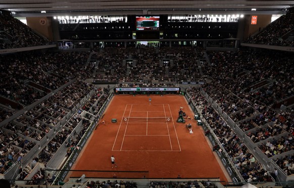 epa11373668 A general view of Court Philippe Chatrier as Rafael Nadal of Spain (back) plays his Men&#039;s Singles 1st round match against Alexander Zverev of Germany during the French Open Grand Slam ...