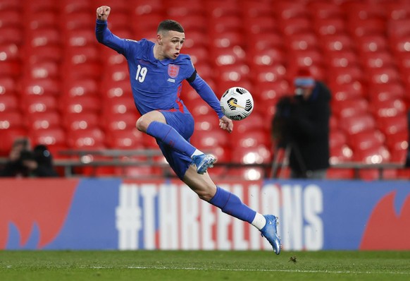 England&#039;s Phil Foden to attempts to control the ball during the World Cup 2022 group I qualifying soccer match between England and San Marino at Wembley stadium in London, Thursday March 25, 2021 ...