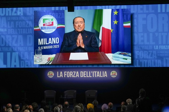 Silvio Berlusconi gestures as he talks in his video address during a Forza Italia party convention in Milan, Italy, Saturday, May 6, 2023. (AP Photo/Luca Bruno)