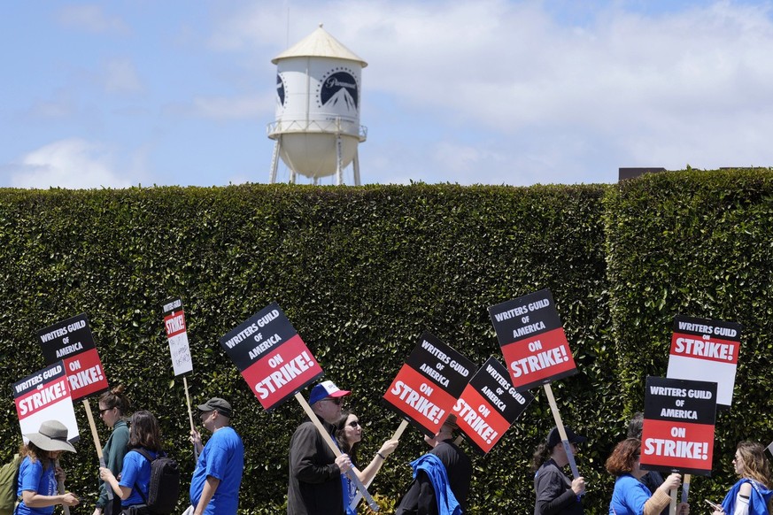 Striking writers take part in a rally in front of Paramount Pictures studio, Tuesday, May 2, 2023, in Los Angeles. Television and movie writers launched a strike for the first time in 15 years, as Hol ...