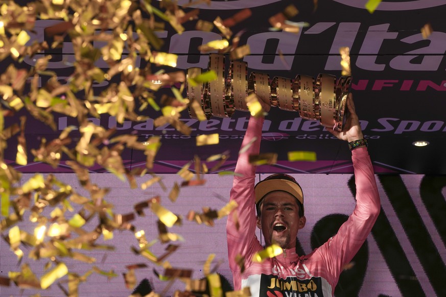 Slovenia&#039;s Primoz Roglic holds the overall winner&#039;s trophy at the end of the 21st and last stage of the Giro D&#039;Italia, tour of Italy cycling race, in Rome, Sunday, May 28, 2023. (AP Pho ...