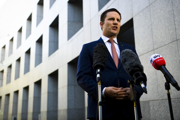 epa09272236 Australian Immigration Minister Alex Hawke speaks to the media during a press conference at Parliament House in Canberra, Australian Capital Territory, Australia, 15 June 2021. A statement ...