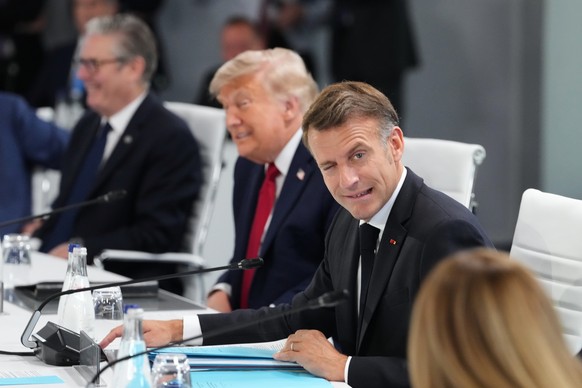 From left, British Prime Minister Keir Starmer, U.S. President Donald Trump, French President Emmanuel Macron and Italian Prime Minister Giorgia Meloni during a working session at the G7 summit in Evi ...