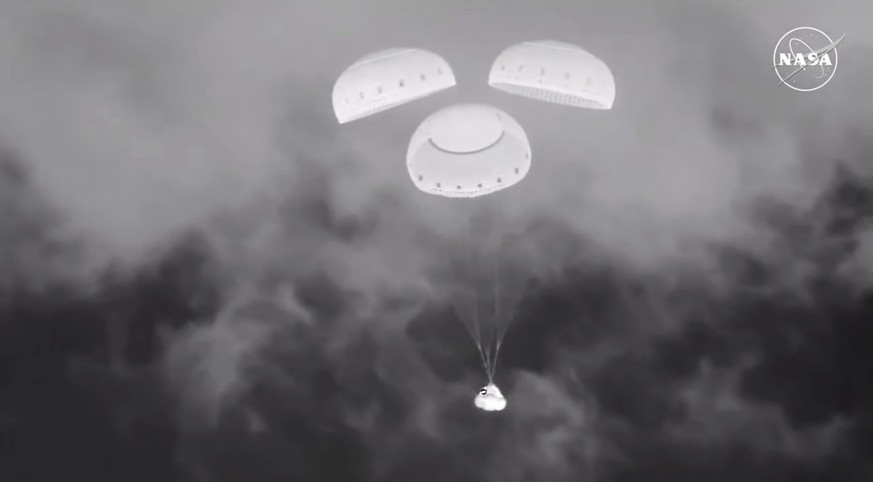 In this image from video provided by NASA, the empty Boeing Starliner capsule floats down towards White Sands Missile Range in New Mexico late Friday, Sept. 6, 2024, after undocking from the Internati ...