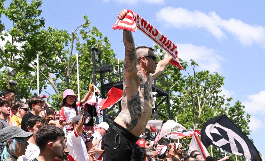 MADRID, SPAIN - APRIL 26: A Rayo Vallecano fan gets behind his tteam during the LaLiga EA Sports match between Rayo Vallecano de Madrid and Real Sociedad at Estadio de Vallecas on April 26, 2026 in Ma ...