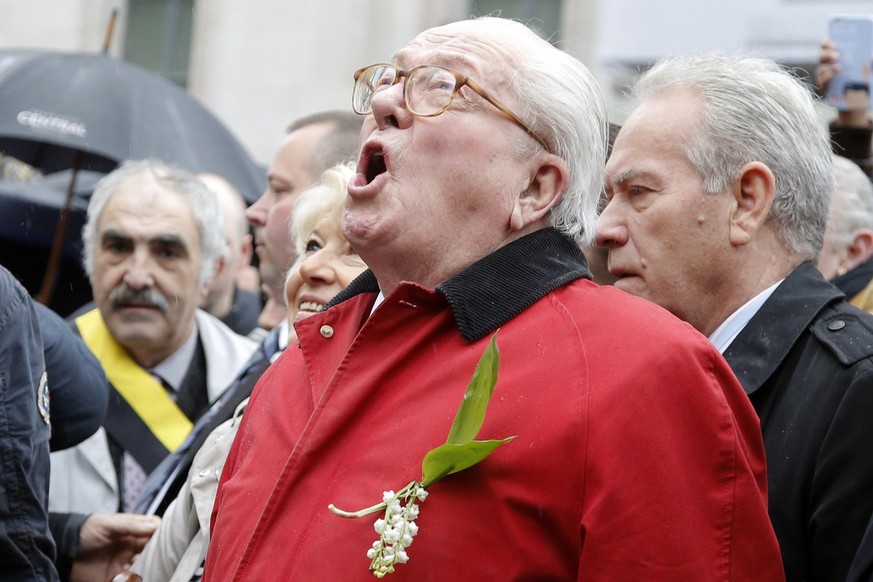 France&#039;s far-right National Front party&#039;s founder Jean-Marie Le Pen screams &quot;Help Jeanne d&#039;Arc&quot; after he places a wreath at Joan of Arc&#039;s statue during its annual May Day ...