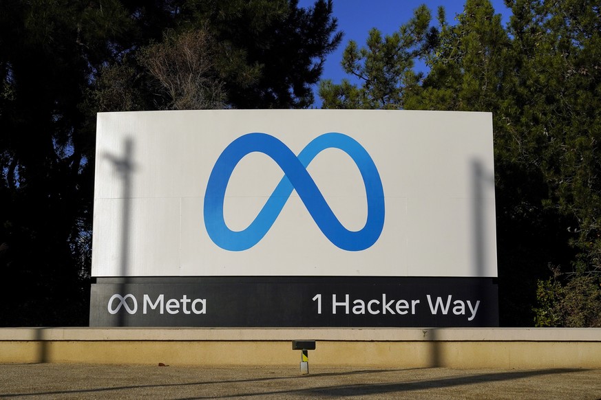 FILE - Meta&#039;s logo is seen on a sign at the company&#039;s headquarters in Menlo Park, Calif., Nov. 9, 2022. The United States signed a memorandum with several of the world?s biggest social media ...
