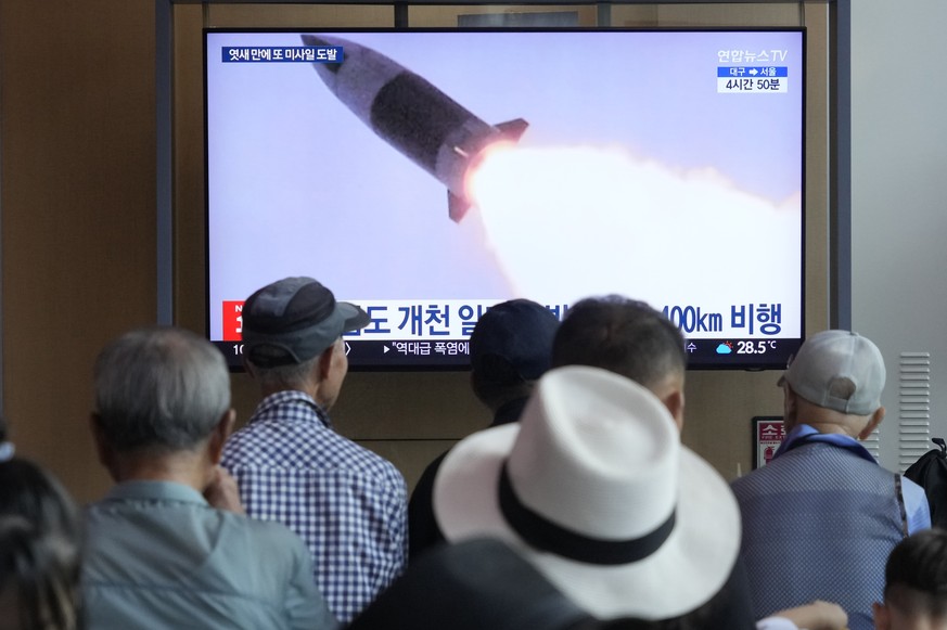 A TV screen shows a file image of North Korea&#039;s missile launch during a news program at Seoul Railway Station in Seoul, South Korea, Wednesday, Sept. 18, 2024. (AP Photo/Ahn Young-joon)
