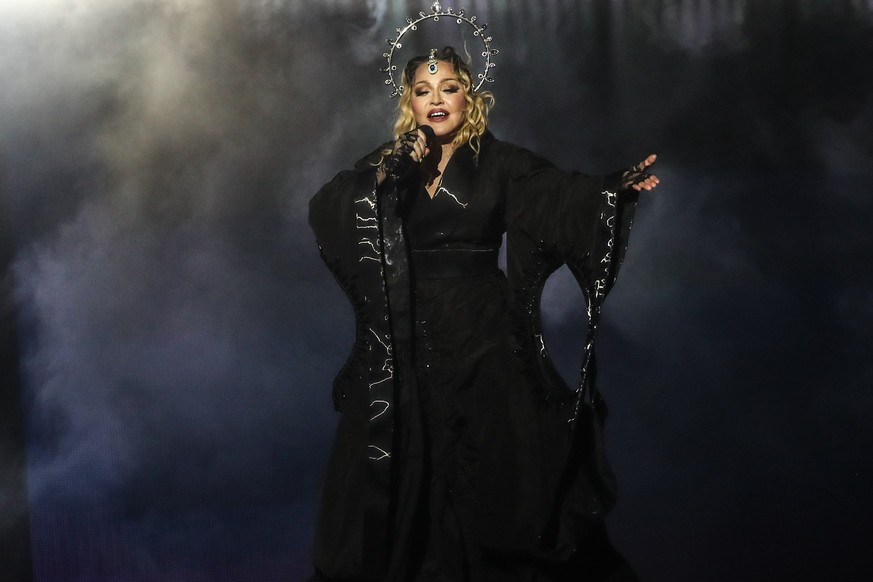 epa11319008 US singer Madonna performs during a free concert, the only presentation of &#039;The Celebration Tour&#039; in South America, on Copacabana beach in Rio de Janeiro, Brazil, 04 May 2024. EP ...