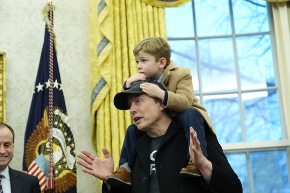 FILE - Elon Musk, joined by his son X � A-Xii, speaks in the Oval Office at the White House, Feb. 11, 2025, in Washington, during an event with President Donald Trump. (AP Photo/Alex Brandon, File)
El ...