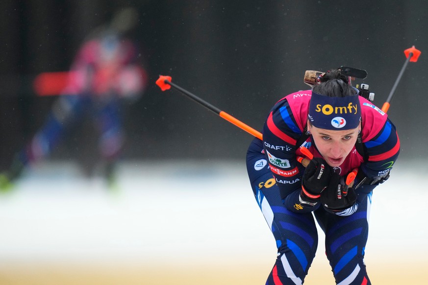 FILE - Julia Simon of France competes during the women&#039;s 10 km pursuit race at the Biathlon World Championship in Nove Mesto na Morave, Czech Republic, Sunday, Feb. 11, 2024. (AP Photo/Petr David ...