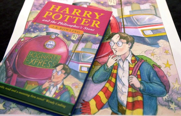 The first edition of the book &quot;Harry Potter and the Philosopher&#039;s Stone&quot;, by J.K.Rowling, estimated price 8-10,000 pounds (dlrs 11-14,000) and the original pencil and watercolour artwor ...