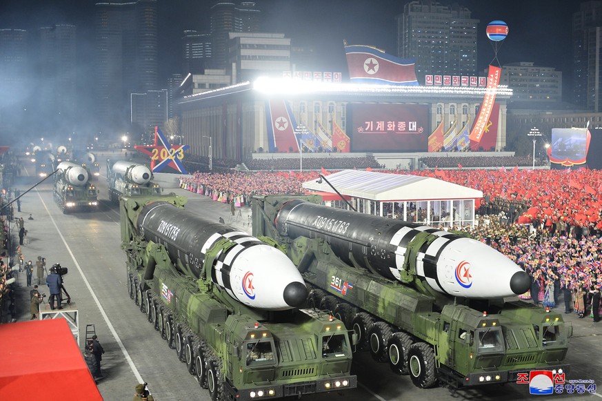 epa10455994 A photo released by the official North Korean Central News Agency (KCNA) shows Hwasong-17 intercontinental ballistic missiles displayed during a military parade at Kim Il Sung Square to ma ...