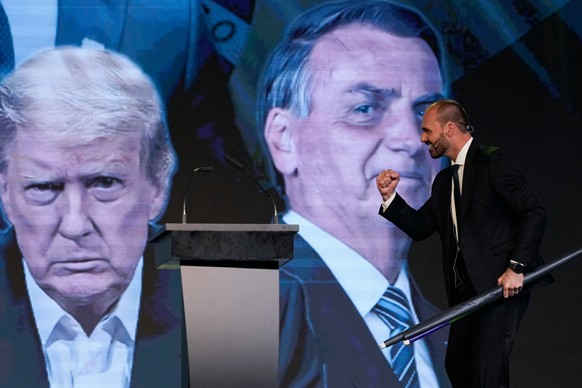FILE - Eduardo Bolsonaro, the son of Brazil's former President Jair Bolsonaro, gestures while giving a speech during the Conservative Political Action Conference in Buenos Aires, Argentina, Dec.  ...