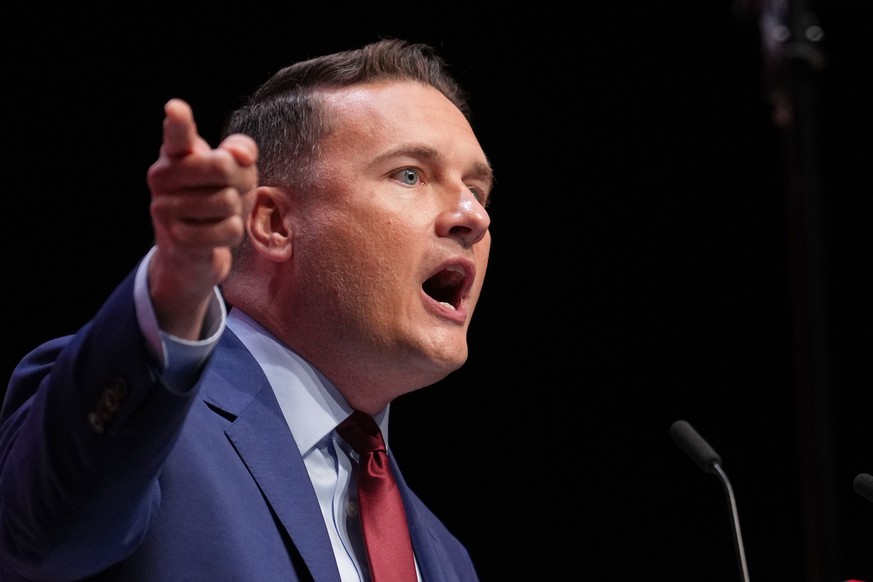 FILE - Britain's then Heath Secretary Wes Streeting gestures as he speaks during the annual Labour Party conference in Liverpool, England, Tuesday, Sept. 30, 2025. (AP Photo/Jon Super, File)
Brit ...