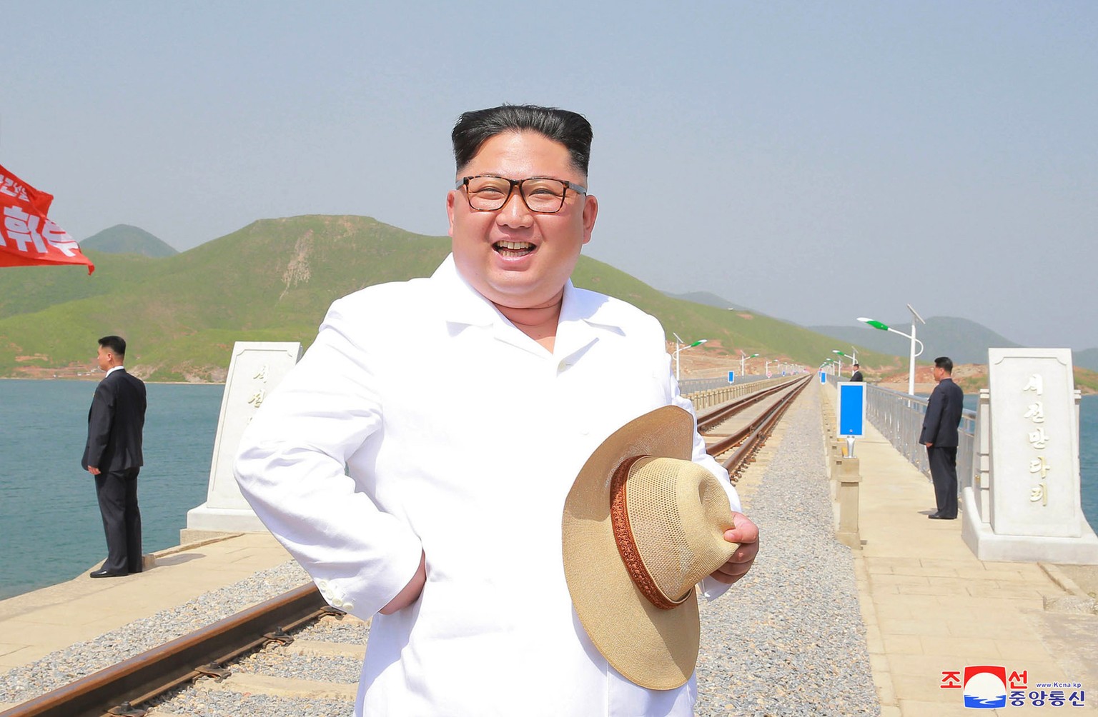 In this undated photo provided on Friday, May 25, 2018, by the North Korean government, North Korean leader Kim Jong Un inspects the completed Koam-Tapchon Railways in Gangwon-do, North Korea. Indepen ...