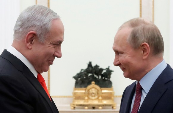 epa08177811 Russian President Vladimir Putin (R) meets with Israeli Prime Minister Benjamin Netanyahu (L) in the Kremlin in Moscow, Russia, 30 January 2020. Netanyahu paid a short working visit to Mos ...