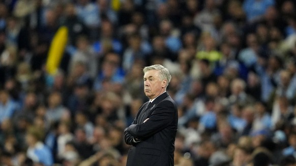 Real Madrid&#039;s head coach Carlo Ancelotti stands by the touchline during the Champions League semifinal second leg soccer match between Manchester City and Real Madrid at Etihad stadium in Manches ...