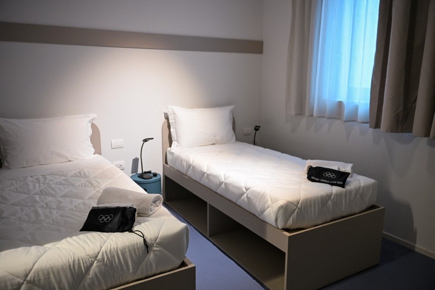 A standard double room for athletes is seen in the Team Italy quarters of the Olympic Village ahead of the Milano Cortina 2026 Winter Olympics in Milan on February 3, 2026. (Photo by PIERO CRUCIATTI / ...