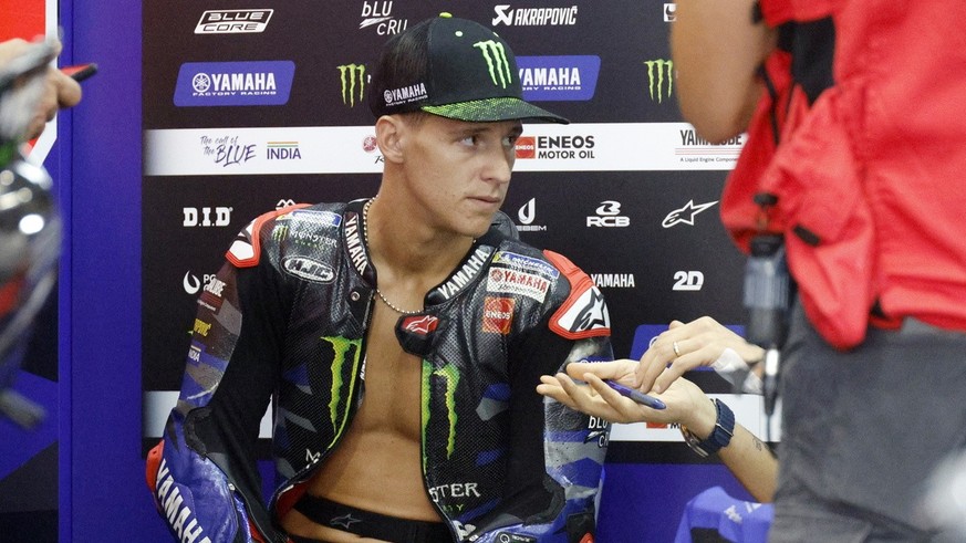 epa11642736 Monster Energy Yamaha rider Fabio Quartararo of France prepares for a MotoGP free practice session of the Motorcycling Grand Prix of Japan in Motegi, Tochigi Prefecture, northern Japan, 05 ...