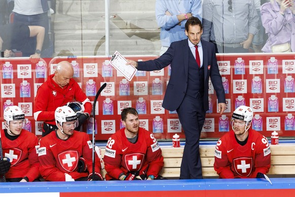 Patrick Fischer, head coach of Switzerland national ice hockey team, reacts, during the IIHF 2023 World Championship preliminary round group B game between Switzerland and Latvia, at the Riga Arena, i ...