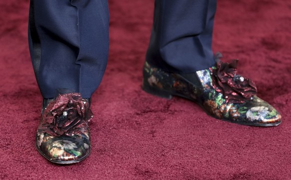 epa11063175 French designer Christian Louboutin arrives for the 81st annual Golden Globe Awards ceremony at the Beverly Hilton Hotel in Beverly Hills, California, USA, 07 January 2024. Artists in vari ...