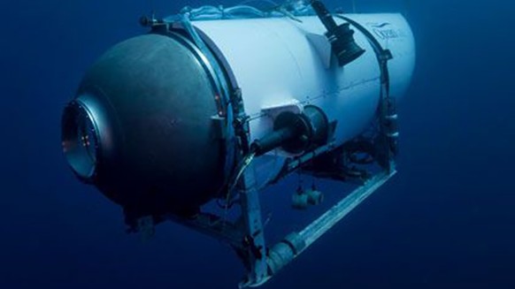 FILE - This undated image provided by OceanGate Expeditions in June 2021 shows the company&#039;s Titan submersible. The wrecks of the Titanic and the Titan sit on the ocean floor, separated by 1,600  ...