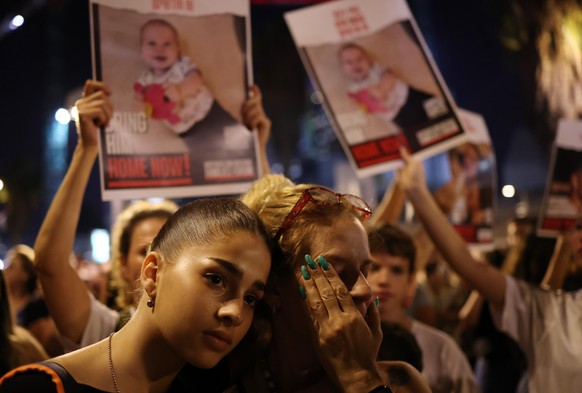 epa10958451 Protesters react as they call for the release of people kidnapped by Hamas during a demonstration near HaKirya base in Tel Aviv, Israel, 04 November 2023. At least 242 hostages, both Israe ...