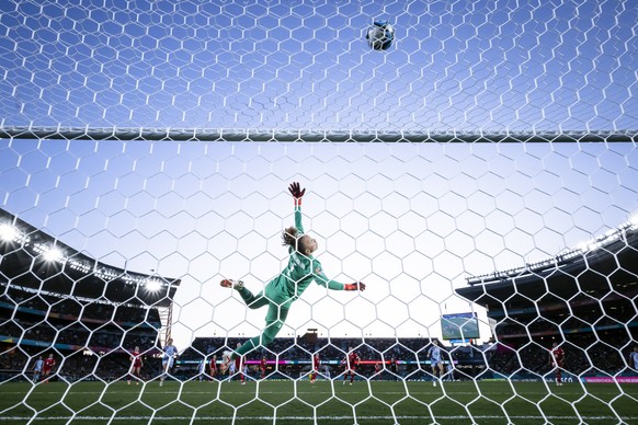 epaselect epa10785456 Switzerland&#039;s goalkeeper Gaelle Thalmann makes a save during the FIFA Women&#039;s World Cup 2023 round of 16 soccer match between Switzerland and Spain at Eden Park in Auck ...