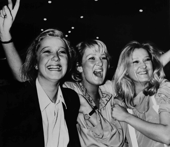 The three daughters of French far right leader Jean Marie Le Pen (unseen), from left: Marine, Yanne and Marie Caroline, are all smiling after the results of the French legislative and regional electio ...