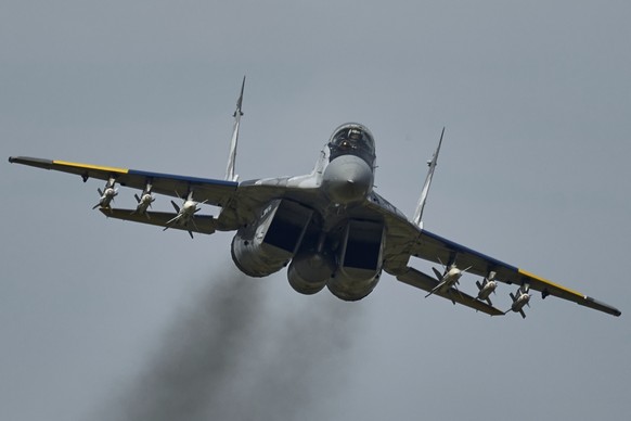 A Mig-29 fighter of the Ukrainian air force is seen on a mission in Ukraine&#039;s war-hit east Wednesday, Aug. 2, 2023. (AP Photo/Libkos)
