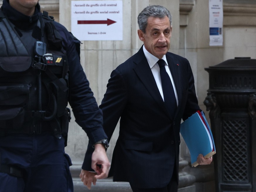 Nicolas Sarkozy à son arrivée au Palais de justice de Paris ce vendredi.