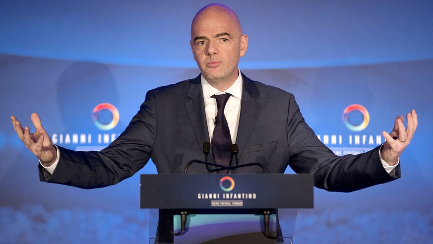 FILE - In this Feb. 1, 2016 file photo FIFA Presidential Candidate Gianni Infantino speaks to the media as he unveils his 90 day plan that he will implement if he is elected FIFA President, at Wembley ...