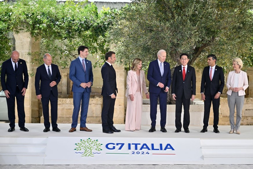 FASANO, ITALY - JUNE 13: Italy's Prime Minister Giorgi Meloni greets President of France Emmanuel Macron during the first day of the G7 meeting at Borgo Egnazia resort, on June 13, 2024 in Fasano ...