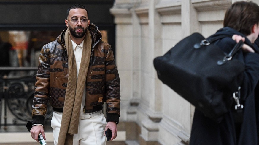 Naps Trial Opens For Sexual Assault Charges - Paris French rapper Nabil Boukhobza aka Naps arrives to attend his trial for sexual assault at the Palais de Justice of Paris, on February 16, 2026. The t ...