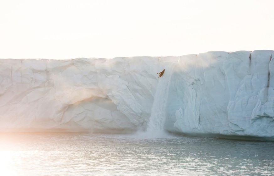 Aniol Serrasolses runs 20m tall waterfall from the Austfonna ice cap to the Arctic Ocean, Svalbard on August 8, 2023 // David Sodomka / Red Bull Content Pool // SI202311180316 // Usage for editorial u ...