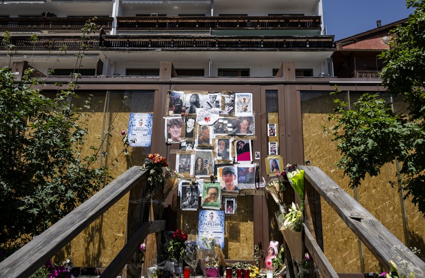 epaselect epa13100250 Portraits of the young victims are displayed at the entrance of the bar Le Constellation six months after a deadly fire, in Crans-Montana, Switzerland, 09 July 2026. Forty-one pe ...