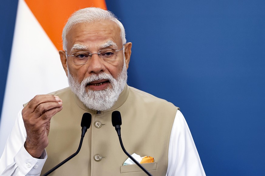 epa12977805 Indian Prime Minister Narendra Modi speaks during a joint press conference with Italian Prime Minister Giorgia Meloni (not pictured) following their meeting at Villa Pamphili in Rome, Ital ...