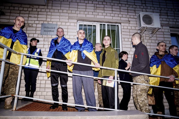 Ukrainian soldiers stand in line after returning from captivity in a POW exchange in Ukraine, on Saturday, April. 19, 2025. (AP Photo/Evgeniy Maloletka)
Russia Ukraine War