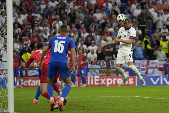 England&#039;s Harry Kane scores his side&#039;s second goal during a round of sixteen match between England and Slovakia at the Euro 2024 soccer tournament in Gelsenkirchen, Germany, Sunday, June 30, ...