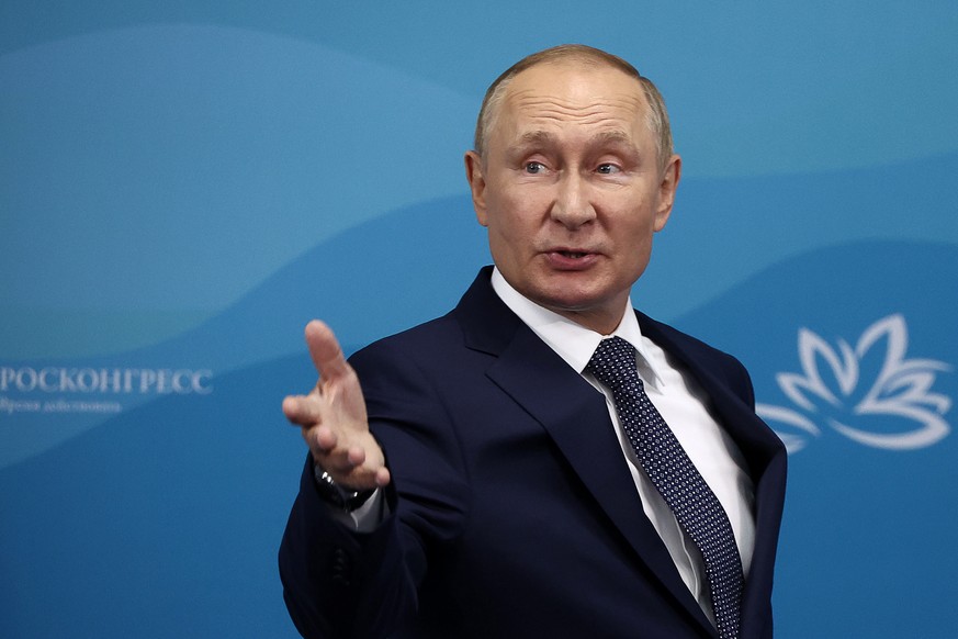 epa10167200 A handout photo made available by the TASS Host Photo Agency shows Russian President Vladimir Putin gestures on the sidelines of the 2022 Eastern Economic Forum (EEF) in Vladivostok, Russi ...