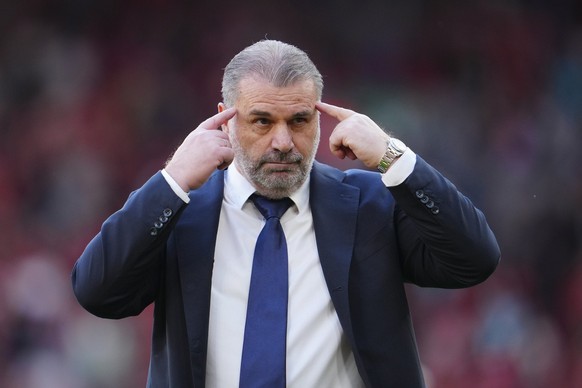 Tottenham&#039;s head coach Ange Postecoglou gestures as he leaves the pitch at the end of the English Premier League soccer match between Liverpool and Tottenham Hotspur at Anfield Stadium in Liverpo ...
