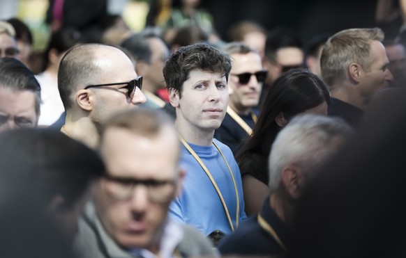 epa11402655 Sam Altman (C), the CEO of OpenAI, in the audience during the 2024 Apple Worldwide Developers Conference (WWDC) on the campus of Apple Park in Cupertino, California, USA 10 June 2024. EPA/ ...