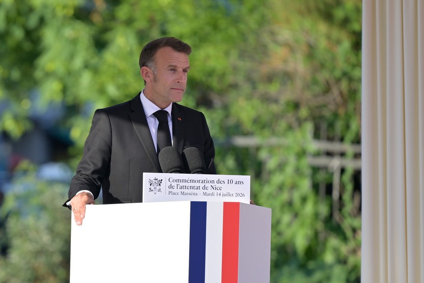 epa13111112 French President Emmanuel Macron delivers a speech during the 10th anniversary of the deadly 2016 truck attack in Nice, southern France, 14 July 2026. On 14 July 2016, a 19-tonne refrigera ...