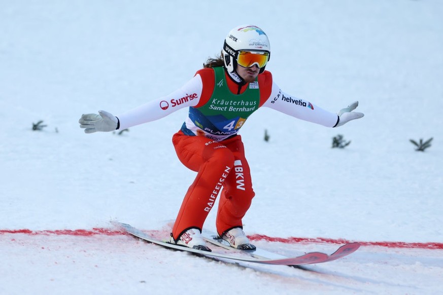 PLANICA, SLOVENIA - MARCH 04: Remo Imhof of Team Switzerland reacts as he lands during the Ski Jumping Men&#039;s Team HS138 at the FIS Nordic World Ski Championships Planica on March 04, 2023 in Plan ...