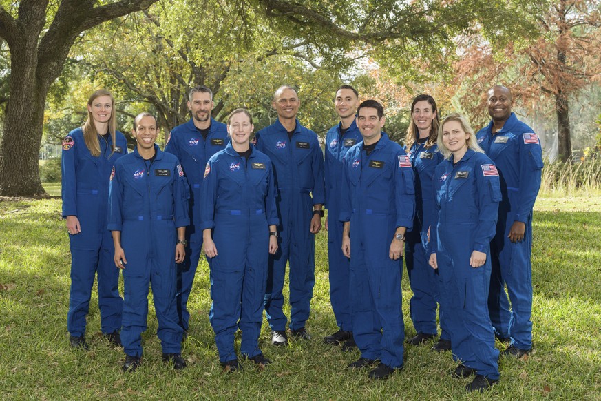 This photo provided by NASA shows its 2021 astronaut candidate class, announced on Monday, Dec. 6, 2021. The 10 candidates stand for a photo at the Johnson Space Center in Houston on Dec. 3, 2021. Fro ...